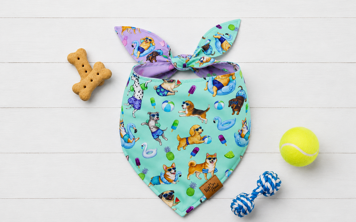The Endless Pawty reversible dog bandana tied flat, mint side with poolside pups and pool floats