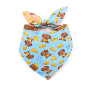 Dog bandana with cartoon dog and cheese pattern on a white background