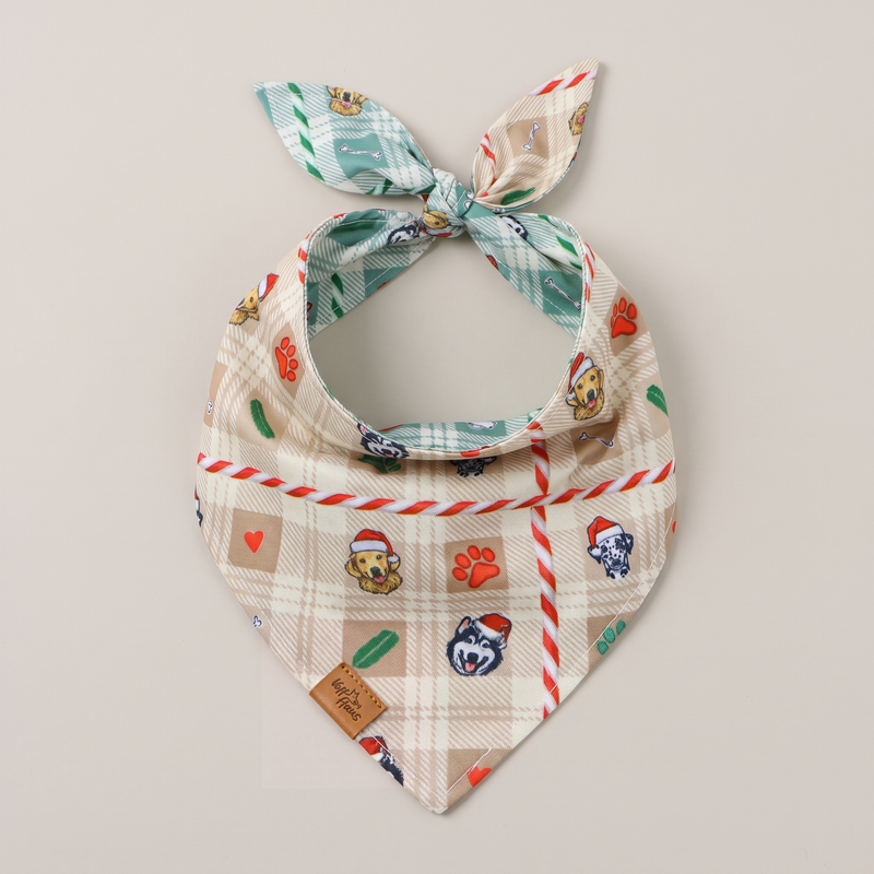 Candy Cane Tails reversible dog bandana, Cream Candy side, tied flat lay
