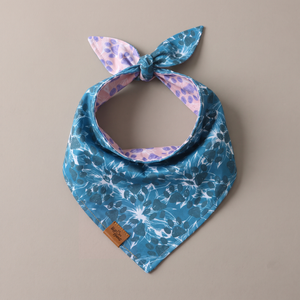Floral Paws reversible dog bandana, Teal Bloom side, tied flat lay